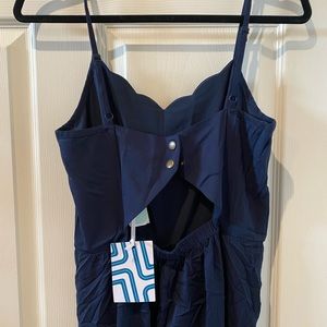 Super cute navy jumpsuit with scalloped edges